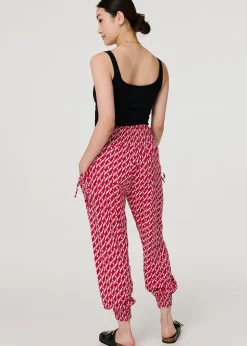Izabel London Red Printed Tapered Harem Trousers