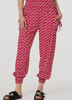Izabel London Red Printed Tapered Harem Trousers
