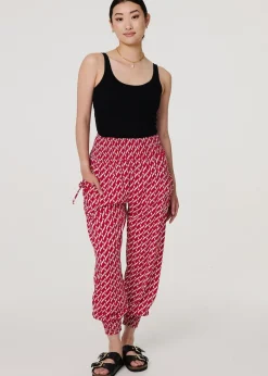 Izabel London Red Printed Tapered Harem Trousers