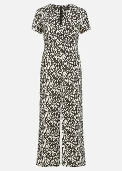 Yumi Black And White Wrap Over Stretch Jumpsuit
